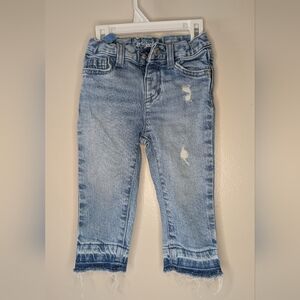 Distressed Light Blue Denim Jeans